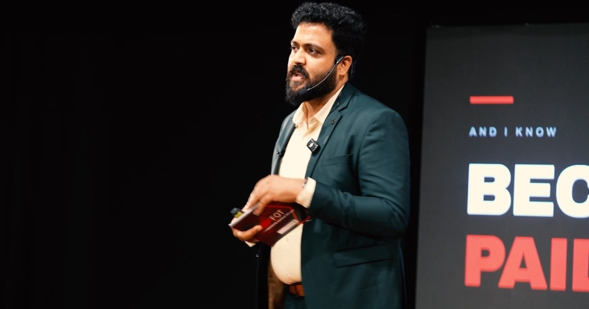 Dr.Nizamudheen Valliyattu on a TEDx stage